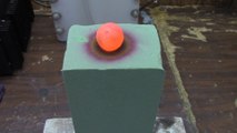 Red Hot Ball of Metal on floral Foam gives many colors!