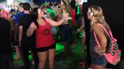 Girl signs song lyrics for her deaf friend at music festival