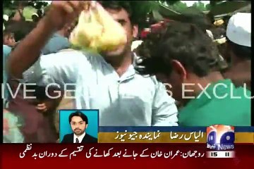 Desperate flood-victims attack food after Imran Khan speech