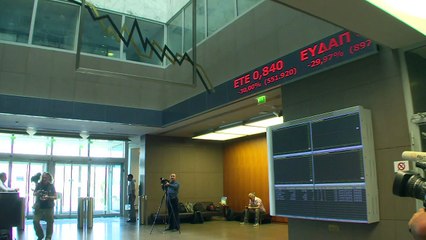 Greek stocks plunge around 20 percent as bourse reopens