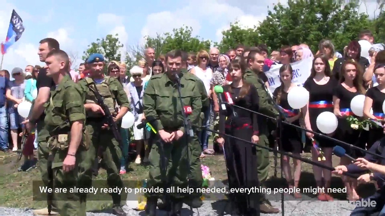 Ukraine separatists, likely culprits in MH17 downing, hold memorial at crash site
