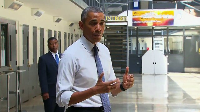 Obama makes historic presidential visit to federal prison