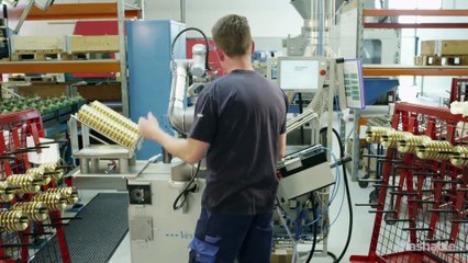 We programmed a manufacturing robot to high five
