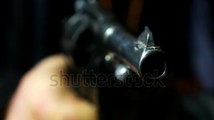 Revolver Shoots - Macro Lens And Slow Motion For 2.5 Times. Stock Footage Video 1488241 - Shutterstock