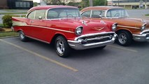 2 1957 chevy bel airs  parked next to each other walkaround