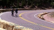 2 Longboarders Hold Hands After Crash During Pikes Peak Downhill Race