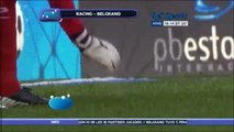 Footbal goalkeeper eats hamburger launched by fan during game - Belgrano vs Racing