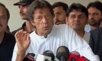Imran dares government to accept PTI MNAs resignations