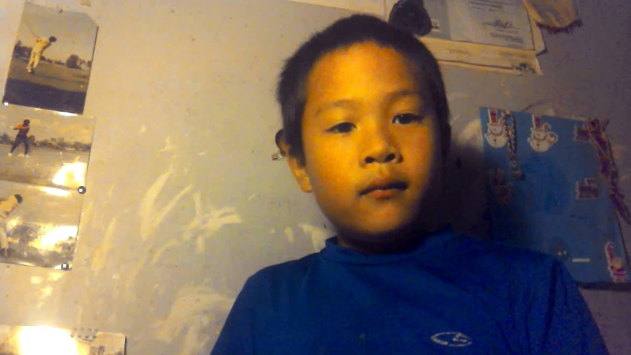 Boy making  a paper airplane