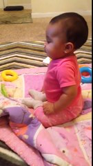 Angelica at 6 1/2 months- loves her Chu Chu TV