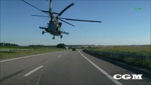 Ukrainian army Helicopter flies few meters above the road!