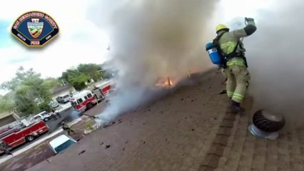 GoPro video shows fire fighters tackling a blaze