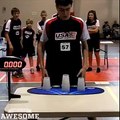 Kid breaks the cup stacking world record...