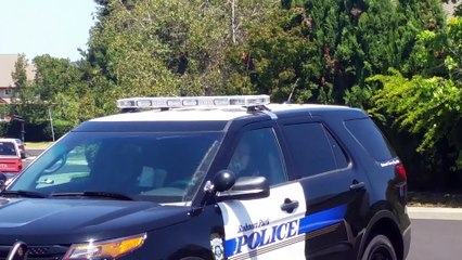 Cop quickly unholsters his weapon for no apparent reason!