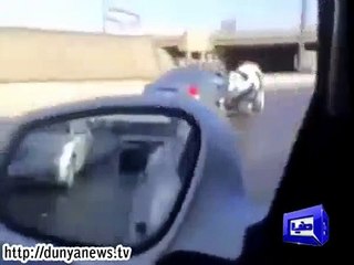 Men perform dangerous stunt in Saudi Arabia .