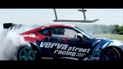 Aerobatic Helicopter Chases Drifting Race Car