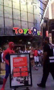 Spiderman fights on Times Square
