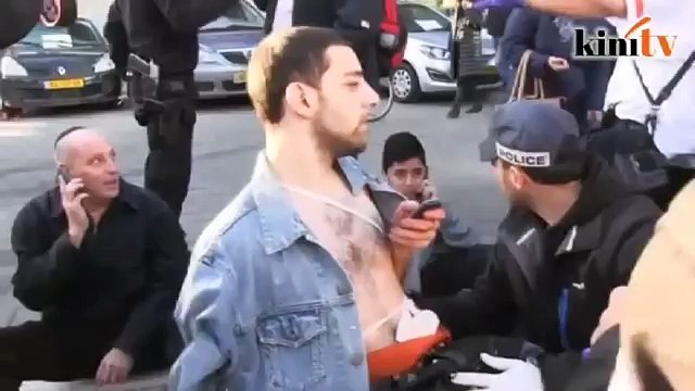 12 wounded in Palestinian knife attack on Tel Aviv bus