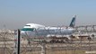 Close up with the Jumbo! Cathay Pacific Boeing 747 landing, taxi, takeoff