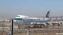 Close up with the Jumbo! Cathay Pacific Boeing 747 landing, taxi, takeoff