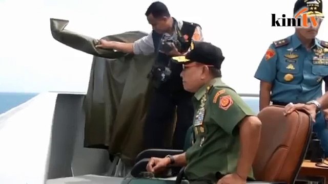 Tail of AirAsia plane brought to land, black boxes found