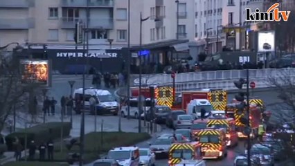 Charlie Hebdo suspects killed as twin sieges shake France