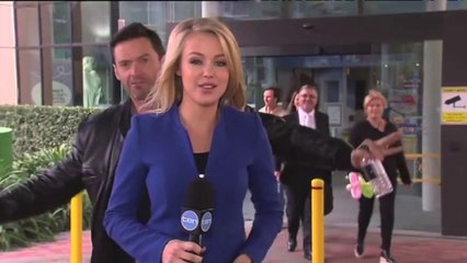 Hugh Jackman Photobombs Channel 10 Reporter and is an eternal Kid!