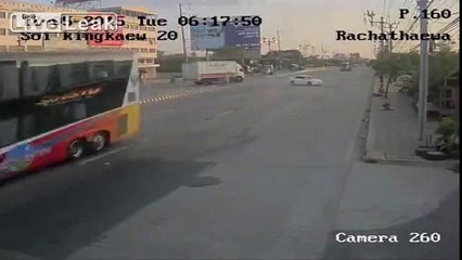 LiveLeak - Motorcyclist With Passenger Pulls in Front of SUV and Gets Sent Flying Down the Road-copypasteads.com