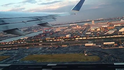 Airplane taking off with the view of New York City