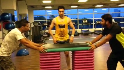 Umar Gul working out in Gym