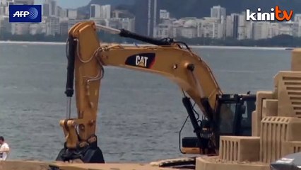 Artist tries for sandcastle world record in Brazil