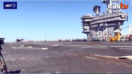 F35 fighter jet completes first carrier landing
