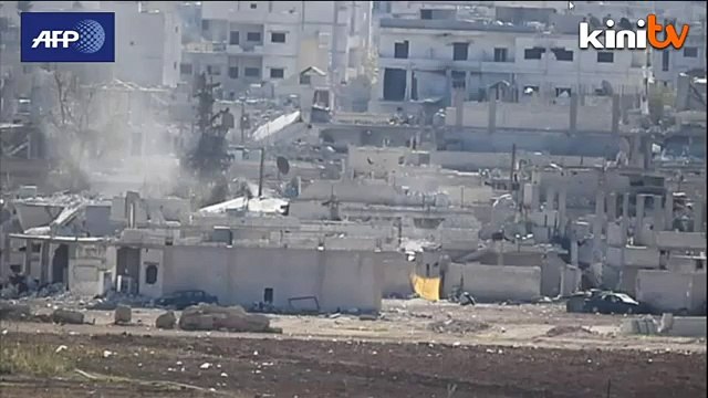 Turkey walks tightrope over Kobane after Peshmerga deployment