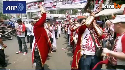 Indonesia inaugurates outsider Widodo as president
