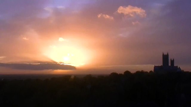 Two suns at sunset over lincoln city are reflections we see on zooming in