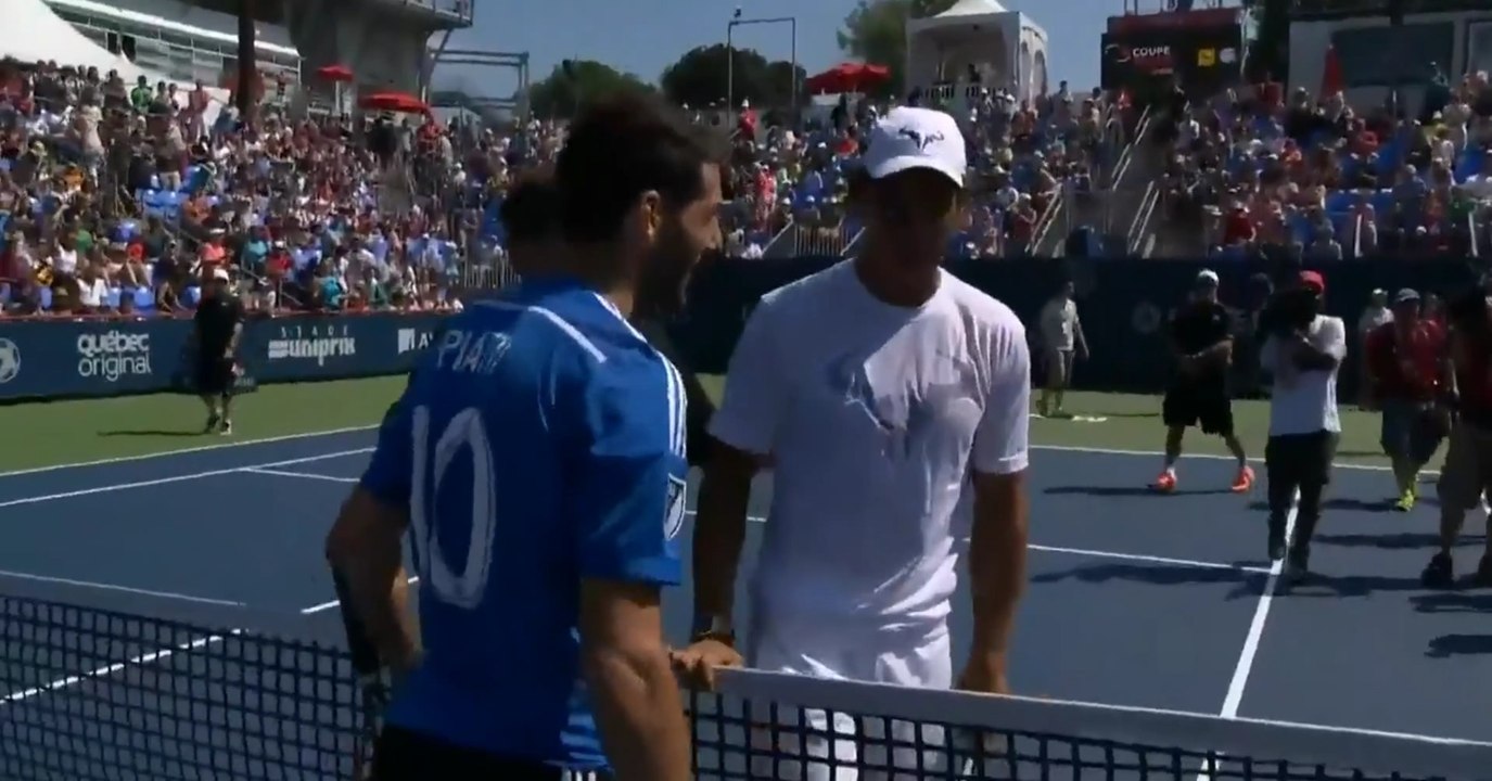 Rafael Nadal plays tennis with Ignacio Piatti (Montreal Impact FC) at Coupe Rogers 2015