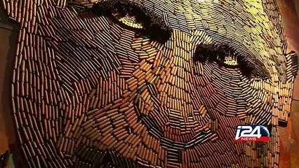 فنانة أوكرانية تعد لوحة للرئيس الروسي من 5000 رصاصة