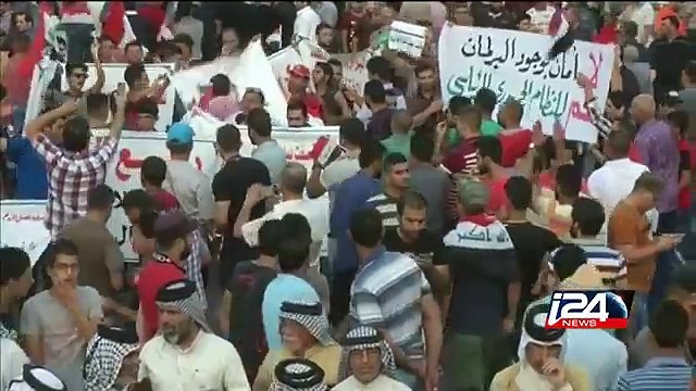 Iraq PM rolls out sweeping reforms after protests