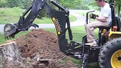 Cub Cadet Yanmar EX3200 - Backhoe digging stump