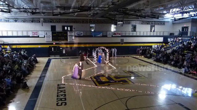 Prom couple make entrance on rollerskates