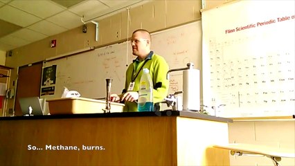 Chemistry teacher performs cool experiments in front of class