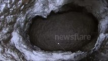 A huge hole in the ground on a flooded mine in Russia in the Urals city of Solikamsk - Part 2