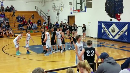 Basketball stuck on rim in final seconds of game