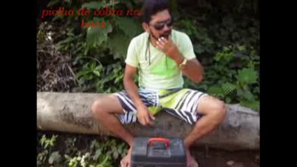 Man puts snake in his own mouth