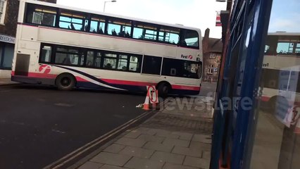 Bus driver attempts challenging turn