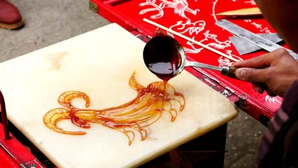 Street vendor creates sheep lollipops to celebrate Chinese New Year