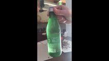 Bottled Water Flash Freezes on Opening