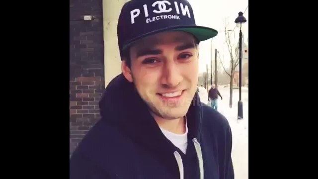 Man ice skates down frozen street in Canada