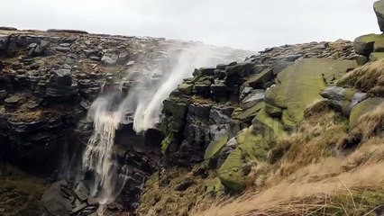Waterfall blown backwards by high winds