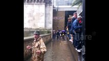 Commuters avoid floodwater in Blackfriars